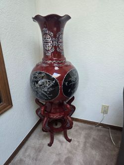 Decorative flower vase on stand