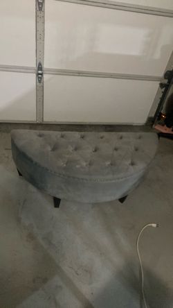 Half moon storage ottoman