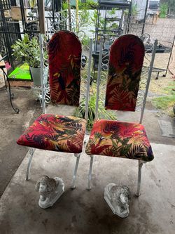 Two chairs two puppies