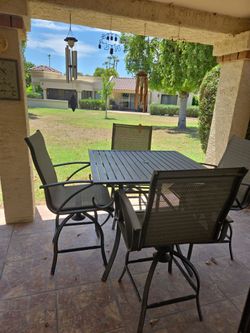 Bar stool patio set with umbrella