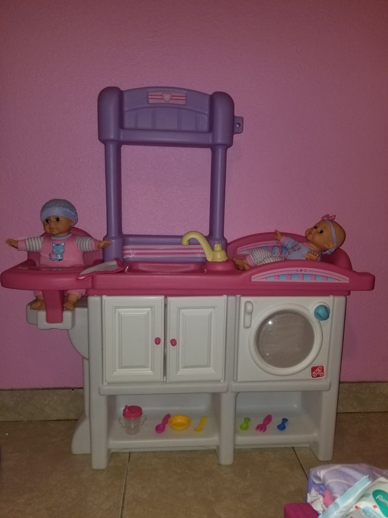 Doll nursery with dolls and accessories