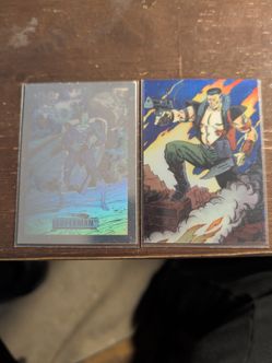 Superman hologram and bloodshot valiant rookie card