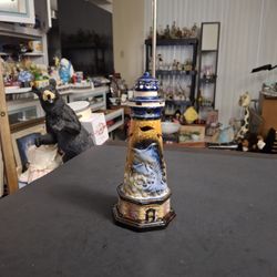 Nautical Themed Lighthouse In Glazed Ceramic Tealight Candle Holder With Raised Relief 3D Details Of Dolphins 8"H Fits Smaller Tealights