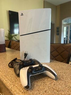PS5 Digital Console + 2 Controllers (1 year old)