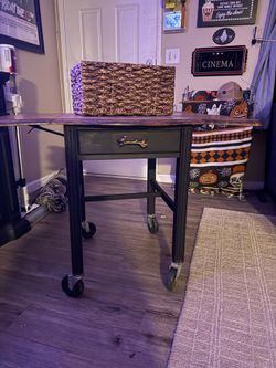 Table with folding sides