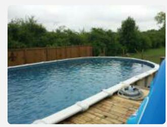 Biggest oval above ground pool with wrap around deck