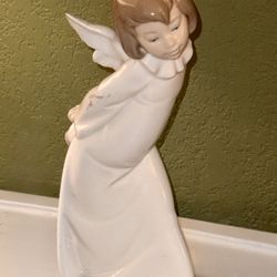 Lladro Curious Angel Figurine