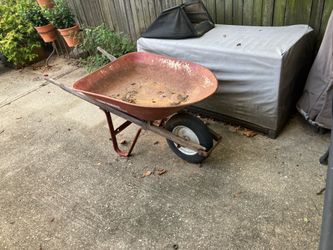 Free rusted wheelbarrow