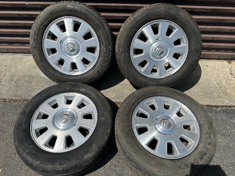 Mercury grand marquis 16 inch wheels and old tires Fit Ford or Lincoln -T06104