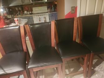 4 chairs and glass table