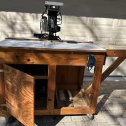 Radial arm saw on heavy cabinet