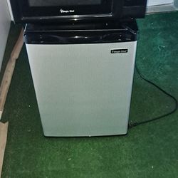 Small new refrigerator and microwave 