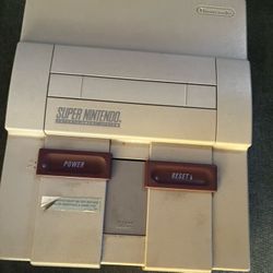 Super Nintendo With 8 Games 