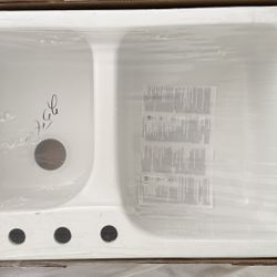 Cambridge Drop-In Acrylic 33 in. x 22 in. x 10-1/2 in. 4-Hole Double Basin Kitchen Sink. Color: Bone New!!!, Never Been Installed Stain, rust and oxid