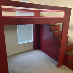 A High Bed Built For Gaming Under It 