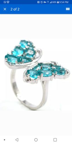 Adorable blue topaz silver filled ring size 7