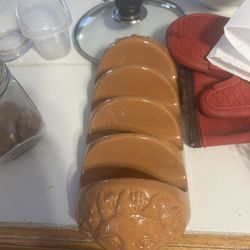 vintage terra-cotta taco holder or rack, featuring a fun dimensional sun face design on both ends. These holders were made in Italy for Boston Warehou