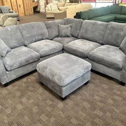 Grey Couch And Ottoman 