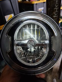 Head Light For A Harley Davidson 5 And 3/4 Quaters