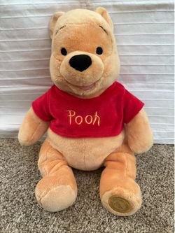 Adorable soft cuddly Disney Store Pooh
