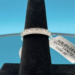 #- 157 Beautiful channel-set moissanite eternity band. Size 6