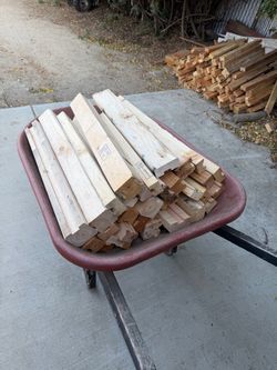Barrow of Lumber wood pieces