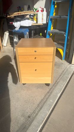 Wooden file cabinet on wheels