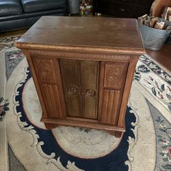 Carved Face Antique Cabinet