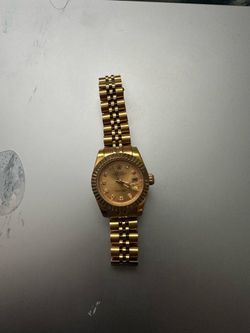 Rolex Gold Tone Woman’s Watch with Champagne Dial