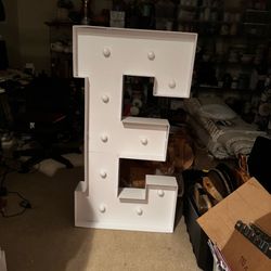 4-foot tall white marquee letter "E"