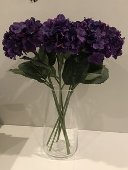Fake Purple Flowers in Glass Vase