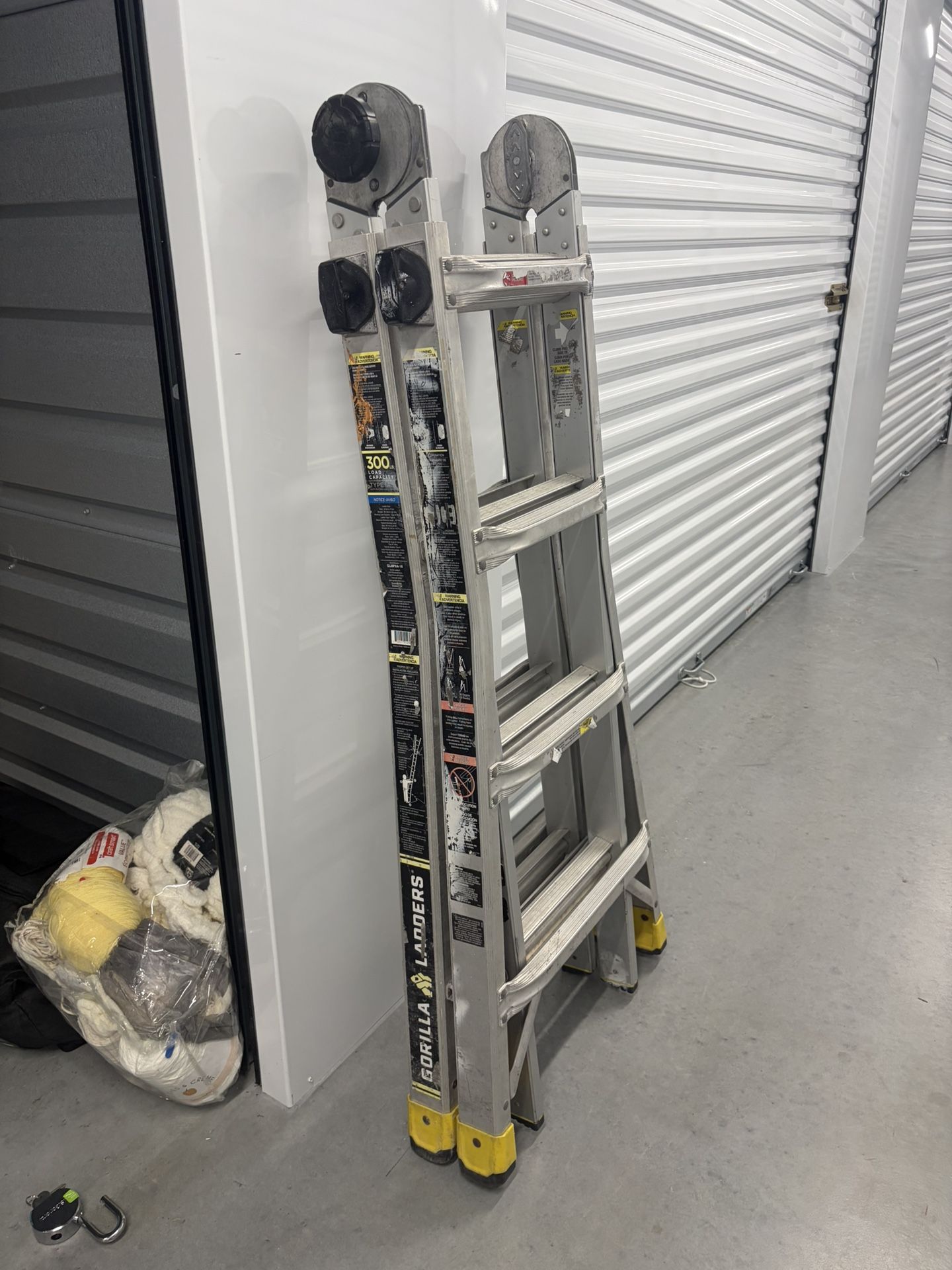 (OBO) Gorilla 13 ft retractable ladder. 300 lb capacity & fully functional. Locks click solid