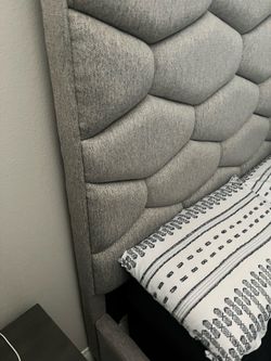 Grey cushioned headboard for sale!