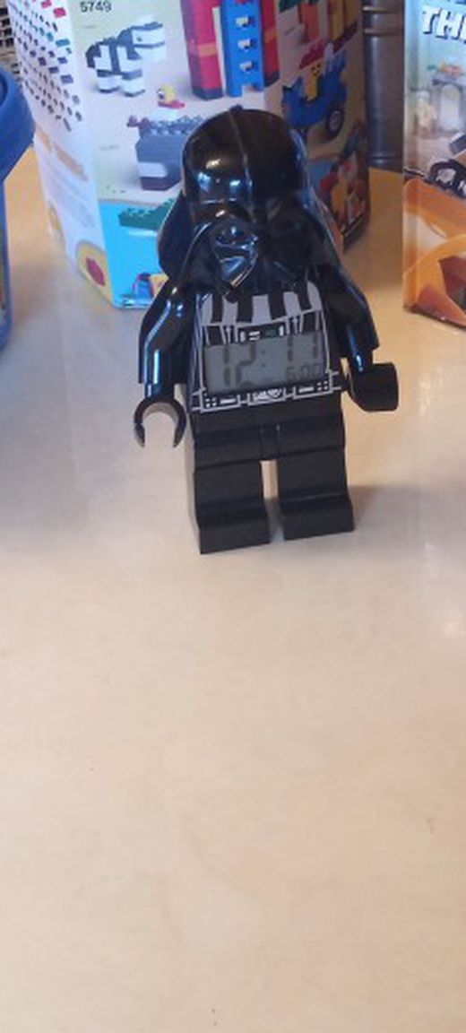2 Sets Of Lego, A Lego Book And A Darth Vader Lego Clock