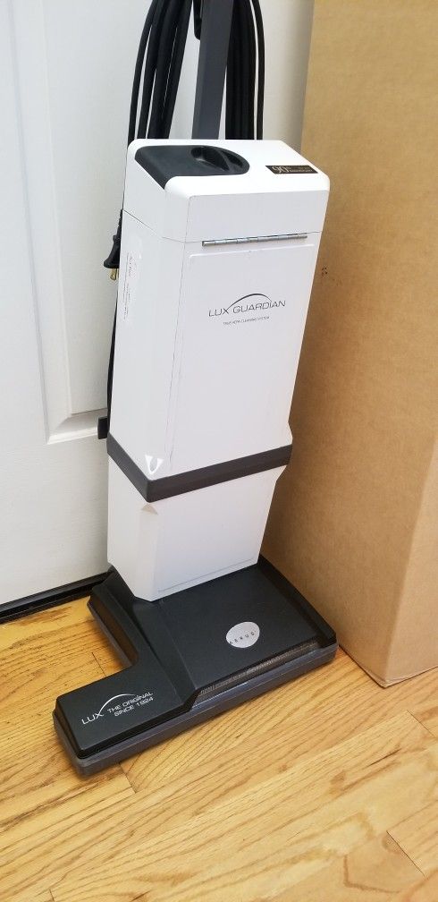 Brand NEW ELECTROLUX LUX VACUUM WITH COMPLETE ATTACHMENTS. , WORKS EXCELLENT , IN THE BOX ,