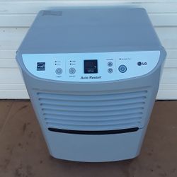LG Humidifier with Auto Restart And On Wheels And With Energy Star Uint Like New. 
