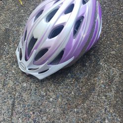 Schwinn purple and blue bike helmets.