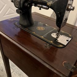 White” Rotary” Antique Sewing Machine In Cab