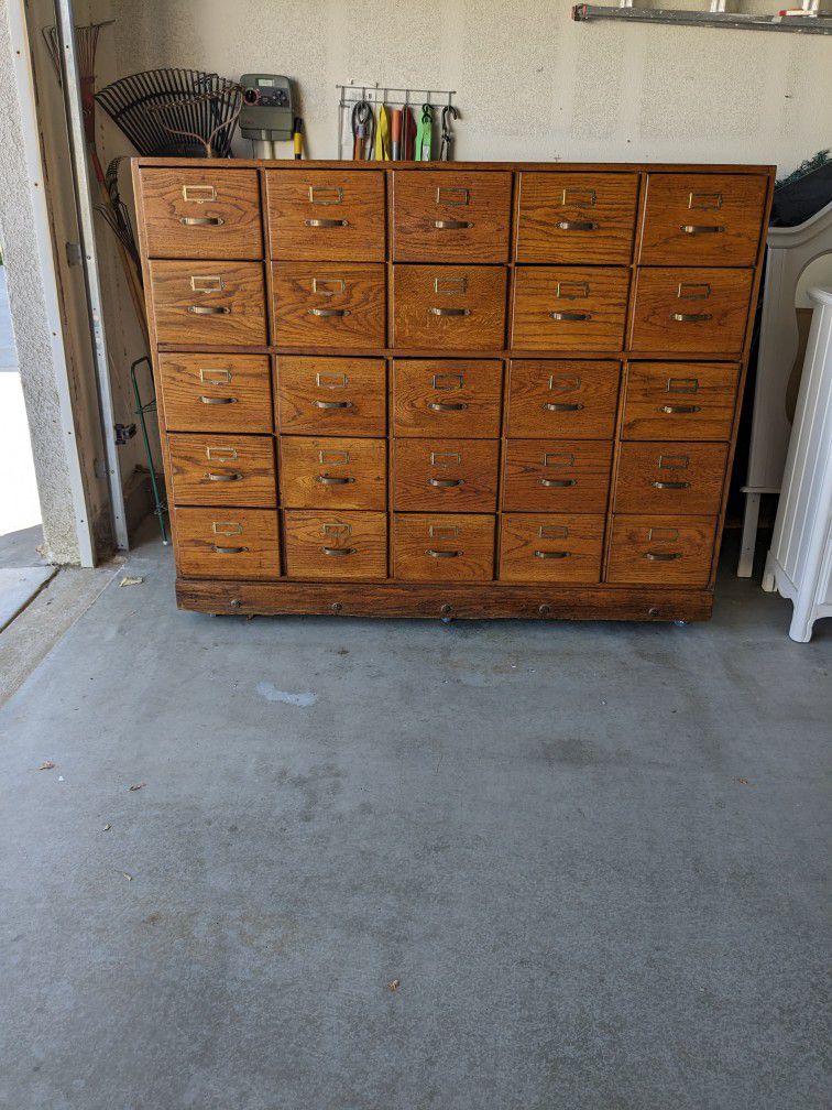 Beautiful Antique File Cabinet On Wheels. All Hand Made It's A Firm Price. It's Worth $6000.00.