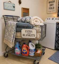 Retired standard size shopping cart for sale. Please note that the items shown inside the cart are not included. You are purchasing the shopping cart 