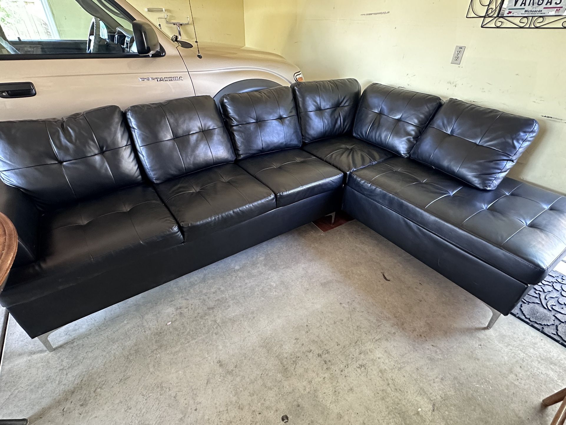 Black leather L Shape Couch