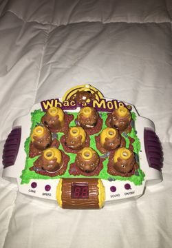 Vintage whac a mole hand held game