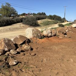 Grading/weed clearing tractor work