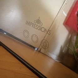 Impressions vanity mirror