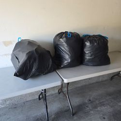 Two bags of clothes, one bag of shoes