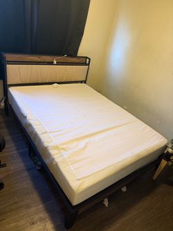 Queen bed, frame with usb ports, with memory foam mattress.