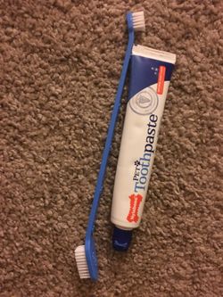 Brand new dog tooth brush tooth paste