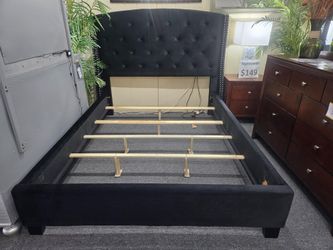 Brand  new black velvet king bedframe (box spring is required)