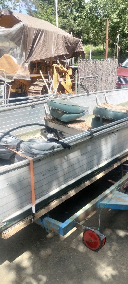 14 Foot Aluminum Boat With Trailer 1969. 40 Hp Motor