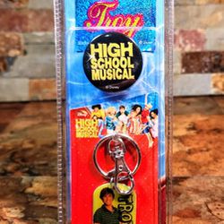 High School Musical - 2 , 3-Pc. Key Chain Set • Set Includes : key Chain , Sticker , Pin . • key Chain Has Image Of  Troy Character • 

TOI-1 